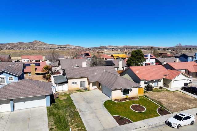 aerial view with a mountain view and a residential view