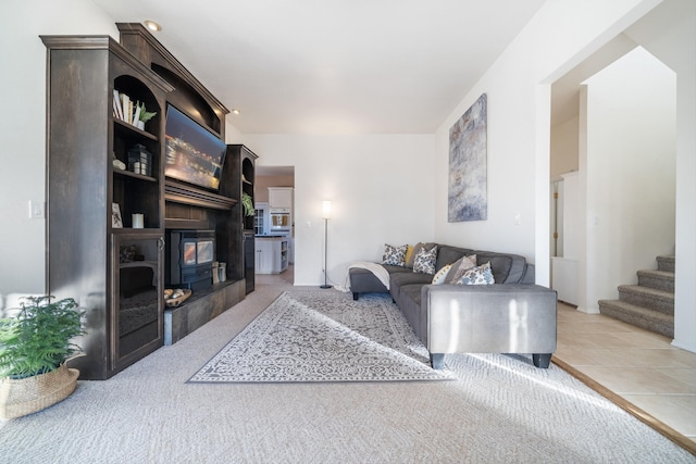 tiled living room with a fireplace