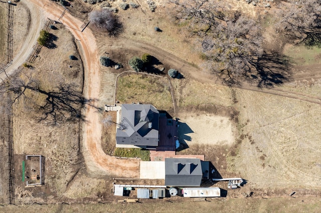 birds eye view of property featuring a rural view