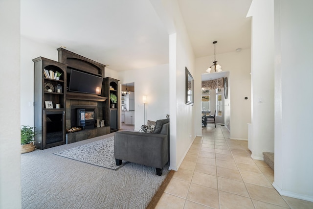 tiled living room with a tile fireplace