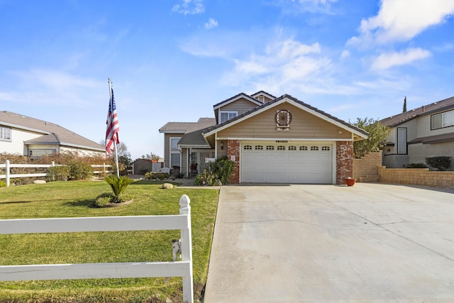 view of front of home with a garage and a front lawn