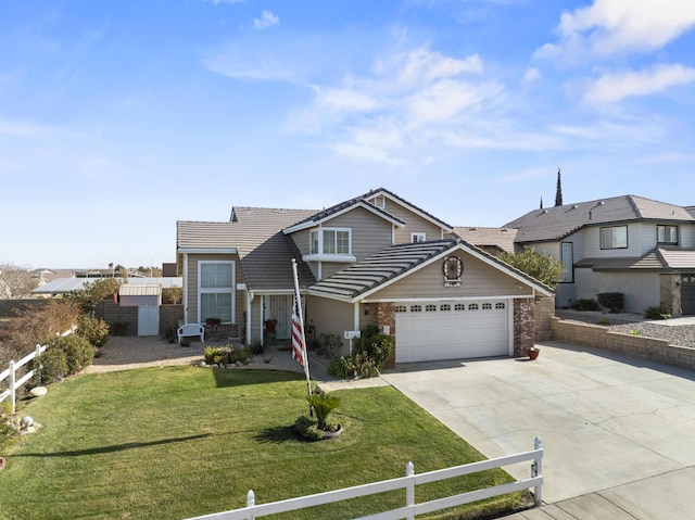 view of front property featuring a front yard and a garage