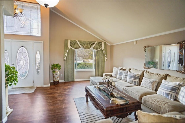 living room with crown molding, dark hardwood / wood-style flooring, and vaulted ceiling