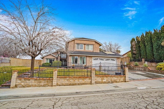 view of front of home with a garage and a front yard