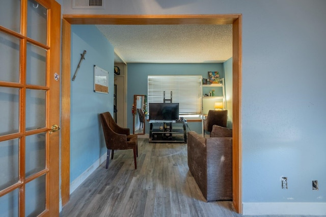 living room with hardwood / wood-style flooring