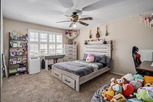 carpeted bedroom with ceiling fan