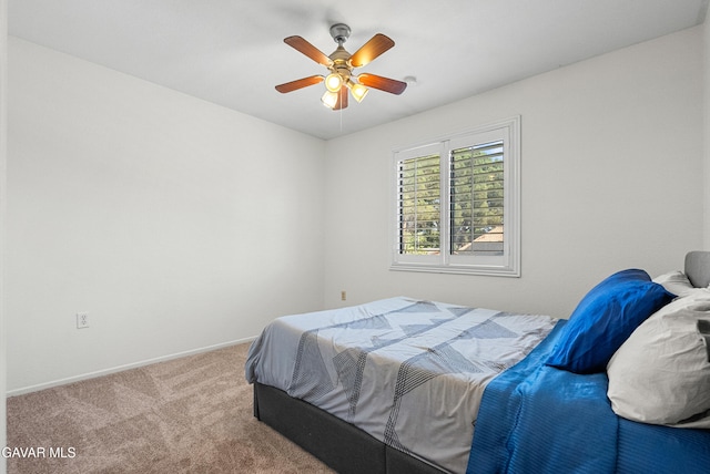 2512 Mildwood Ct, Lancaster, CA 93536 - carpeted bedroom with baseboards and a ceiling fan