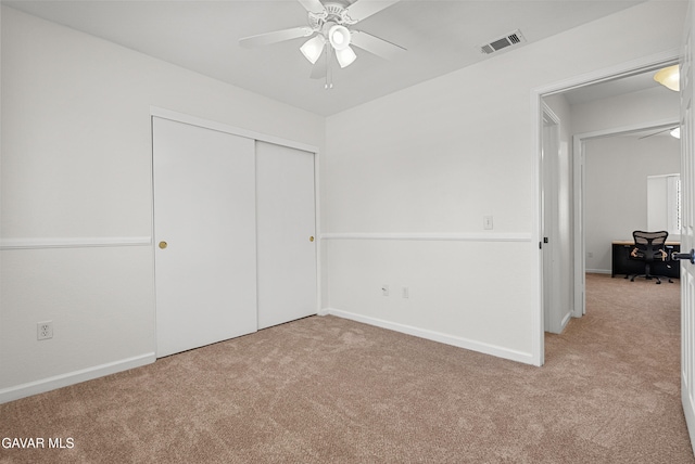 2512 Mildwood Ct, Lancaster, CA 93536 - unfurnished bedroom with carpet flooring, a closet, a desk, and a ceiling fan