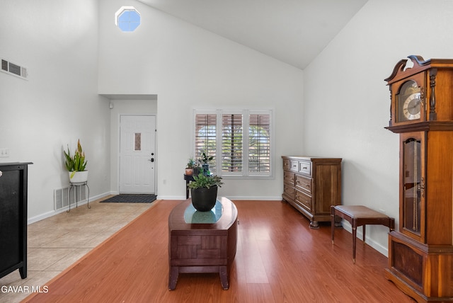 2512 Mildwood Ct, Lancaster, CA 93536 - living area with high vaulted ceiling and wood finished floors