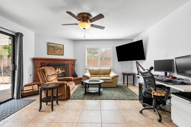 2512 Mildwood Ct, Lancaster, CA 93536 - office space with a brick fireplace, ceiling fan, and light tile patterned floors
