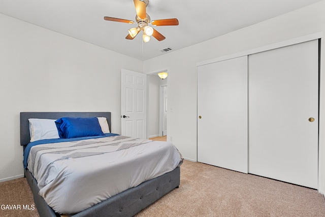 2512 Mildwood Ct, Lancaster, CA 93536 - carpeted bedroom with a closet and a ceiling fan