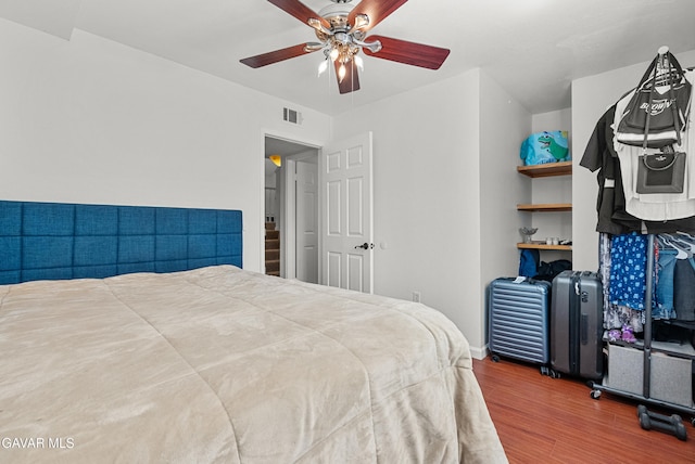 2512 Mildwood Ct, Lancaster, CA 93536 - bedroom with wood finished floors and a ceiling fan