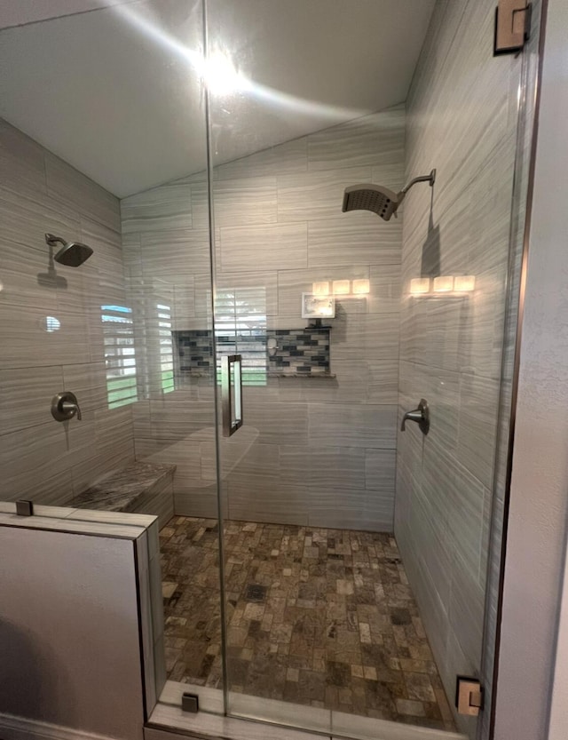 bathroom featuring an enclosed shower