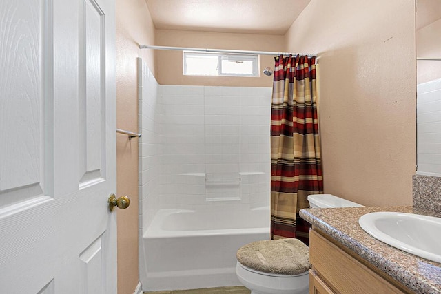 full bathroom featuring vanity, toilet, and shower / tub combo