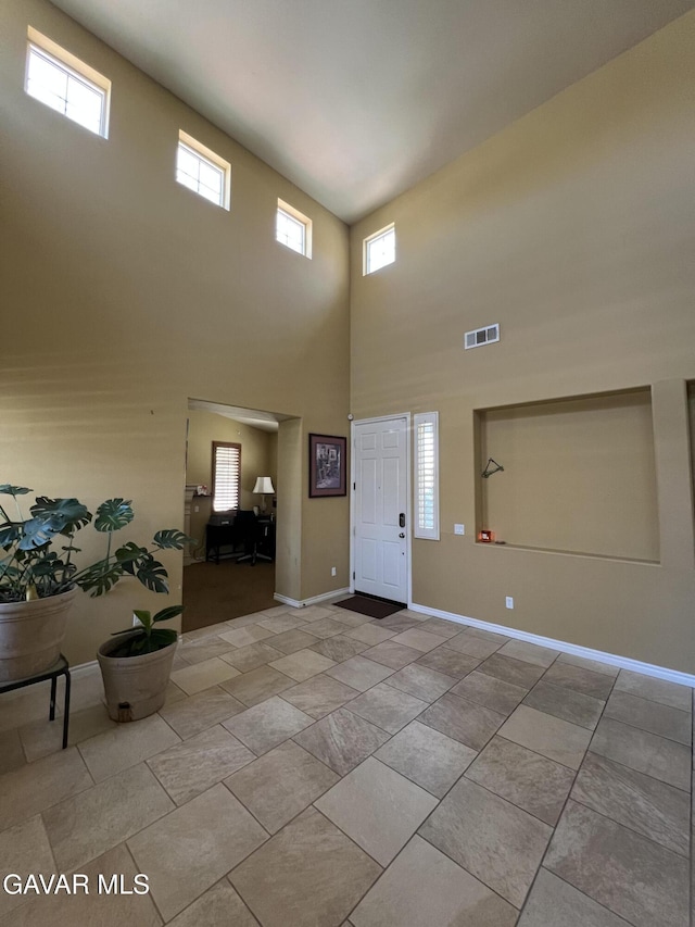 2812 Crocus Pl, Palmdale, CA 93551 - foyer entrance with plenty of natural light and a towering ceiling