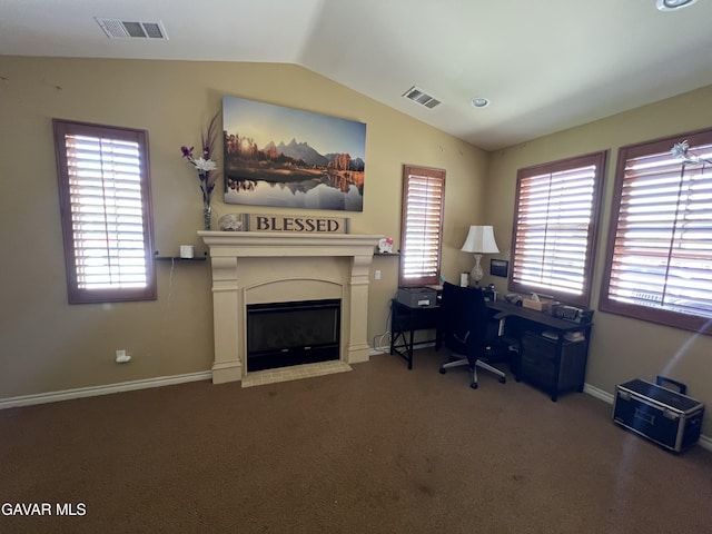 2812 Crocus Pl, Palmdale, CA 93551 - carpeted home office with vaulted ceiling, a fireplace with flush hearth, and healthy amount of natural light