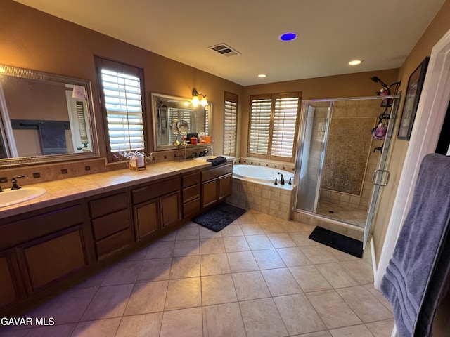 2812 Crocus Pl, Palmdale, CA 93551 - full bathroom with plenty of natural light, a bath, double vanity, tile patterned flooring, and recessed lighting