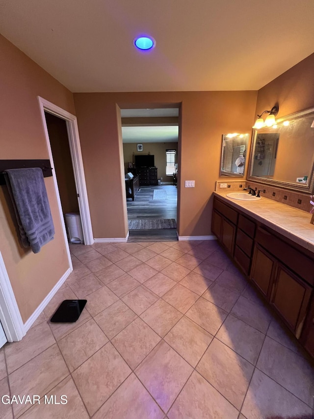 2812 Crocus Pl, Palmdale, CA 93551 - full bathroom featuring double vanity, tile patterned flooring, connected bathroom, and recessed lighting