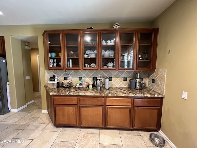 2812 Crocus Pl, Palmdale, CA 93551 - bar with tasteful backsplash, freestanding refrigerator, and light tile patterned floors