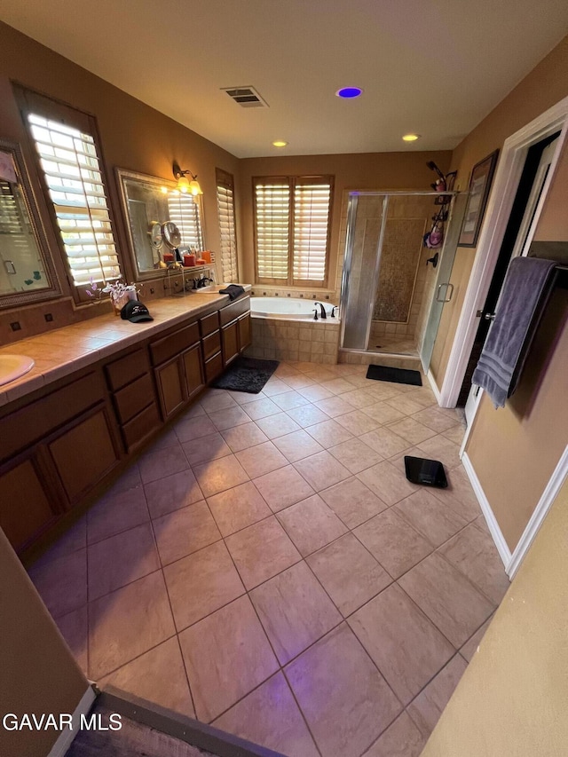 2812 Crocus Pl, Palmdale, CA 93551 - full bath featuring tile patterned floors, a bath, a shower stall, double vanity, and recessed lighting