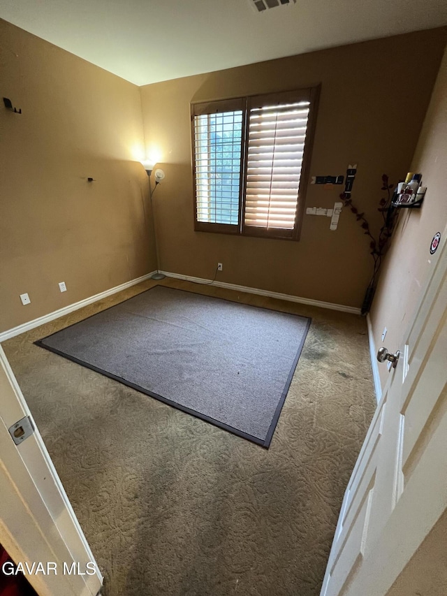 2812 Crocus Pl, Palmdale, CA 93551 - carpeted empty room with baseboards