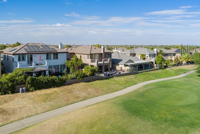 surrounding community featuring a lawn