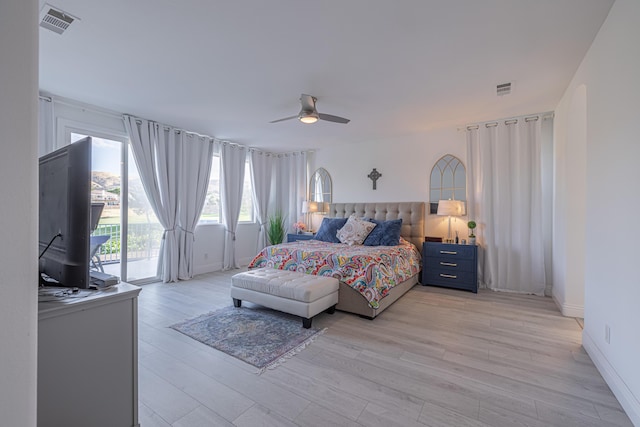 bedroom with ceiling fan, light hardwood / wood-style floors, and access to outside