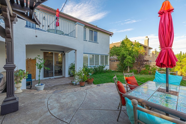 view of patio / terrace with a balcony