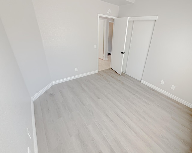 empty room with light wood-type flooring