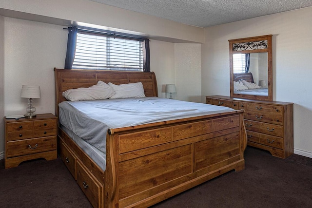 carpeted bedroom featuring a textured ceiling and multiple windows