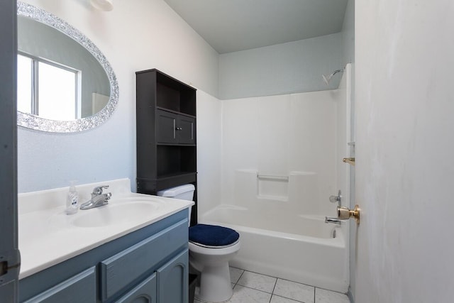 full bathroom featuring toilet, tile patterned floors, vanity, and shower / bathing tub combination