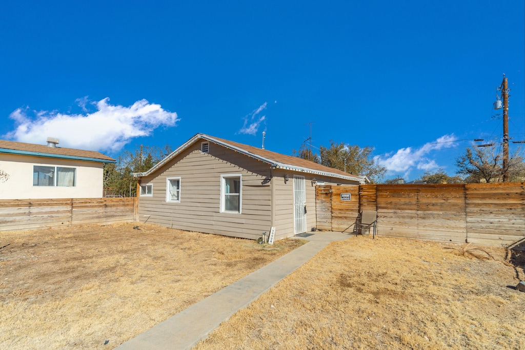 exterior space with fence