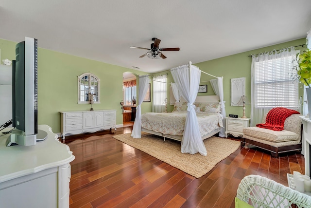 bedroom featuring dark hardwood / wood-style floors and ceiling fan