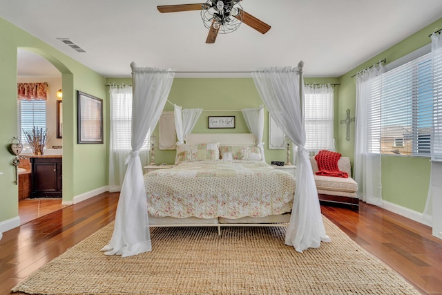 bedroom with hardwood / wood-style flooring and ceiling fan