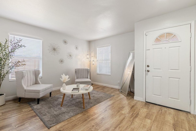 40305 Reata Rd, Palmdale, CA 93550 - foyer entrance featuring light wood finished floors and baseboards