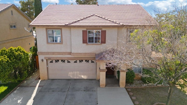40305 Reata Rd, Palmdale, CA 93550 - traditional-style home with stucco siding, an attached garage, driveway, and a tile roof