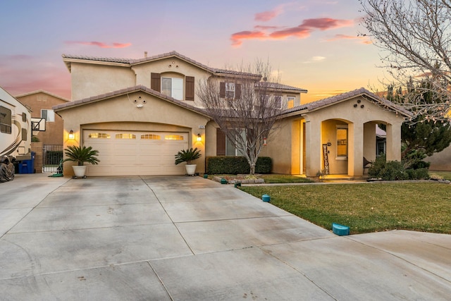 mediterranean / spanish home featuring a yard