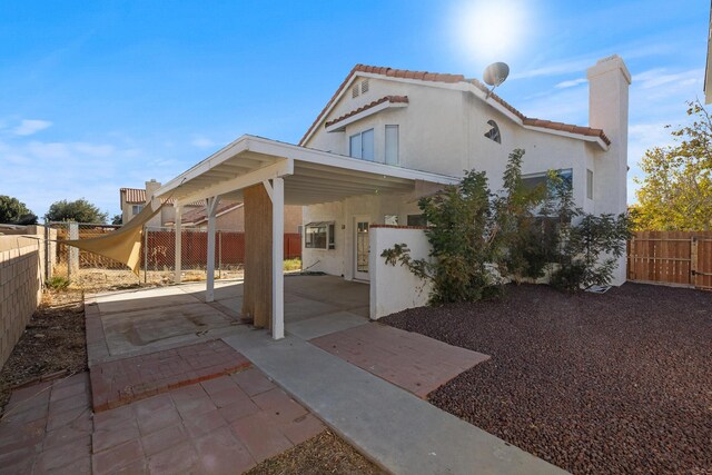 exterior space with a carport