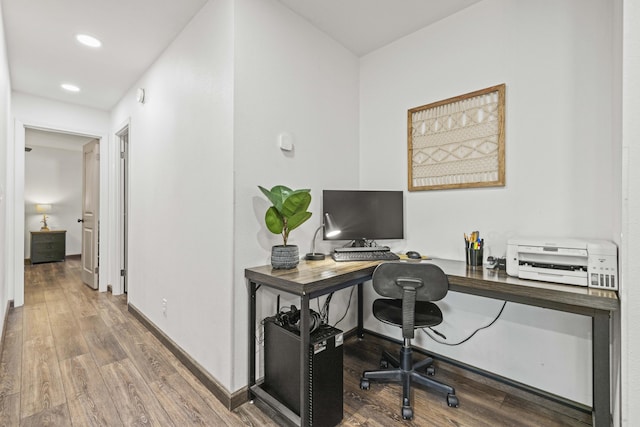 office space featuring recessed lighting, baseboards, and wood finished floors