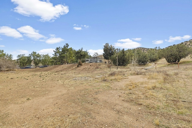 view of landscape with a rural view