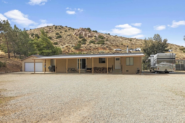 view of front facade with a mountain view and entry steps