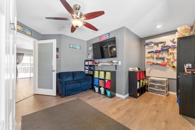 18551 Jacks Hill Rd, Tehachapi, CA 93561 - playroom with a ceiling fan, wood finished floors, french doors, and recessed lighting