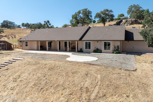 18551 Jacks Hill Rd, Tehachapi, CA 93561 - back of house with a patio and roof with shingles