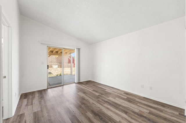 3243 Geri Ct, Rosamond, CA 93560 - unfurnished room featuring wood finished floors, lofted ceiling, a textured ceiling, and baseboards