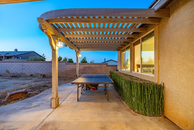 view of patio featuring a pergola