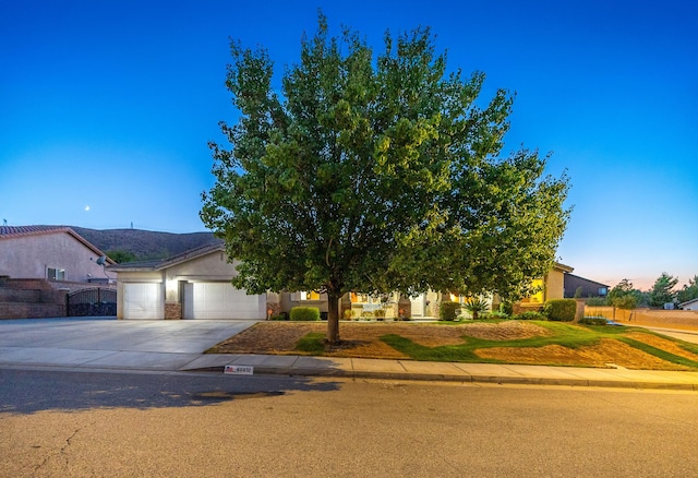 obstructed view of property with a garage