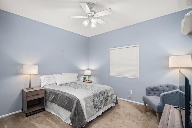 bedroom featuring light colored carpet and ceiling fan