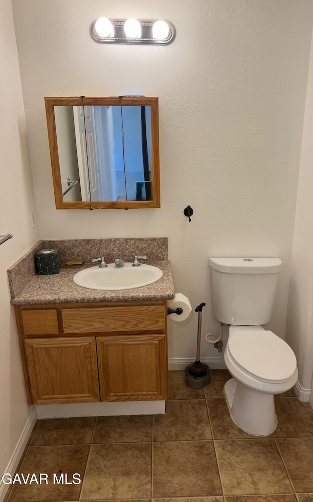 13320 E Ave W6, Pearblossom, CA 93553 - half bathroom with vanity and tile patterned flooring