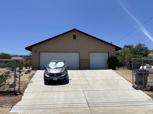 13320 E Ave W6, Pearblossom, CA 93553 - garage with concrete driveway