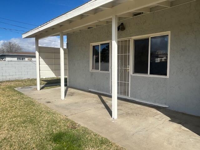 view of patio with fence